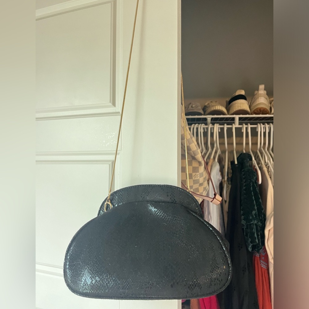 gold and black snakeskin purse